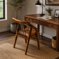 WOODEN DINING ARMCHAIR WITH BLACK METAL SPINDLE BACK AND TAN CUSHION