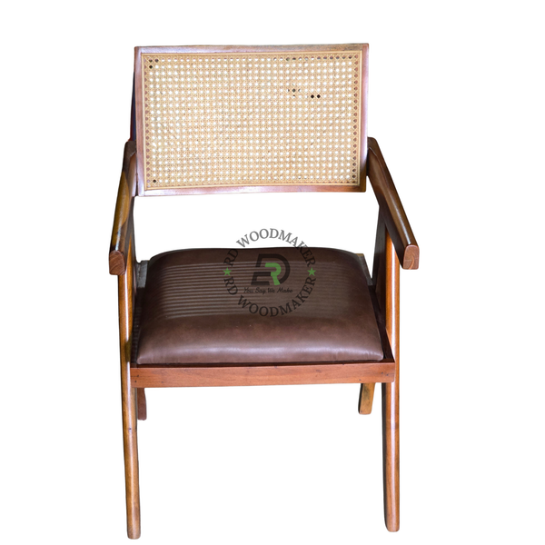 MID-CENTURY CANE BACK WOODEN ARMCHAIR WITH DARK BROWN CUSHION