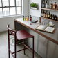 MINIMALIST BURGUNDY METAL BAR STOOL WITH CONTOURED SEAT & FOOTREST