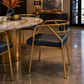PREMIUM GOLD METAL ARMCHAIR WITH BLACK UPHOLSTERED SEAT