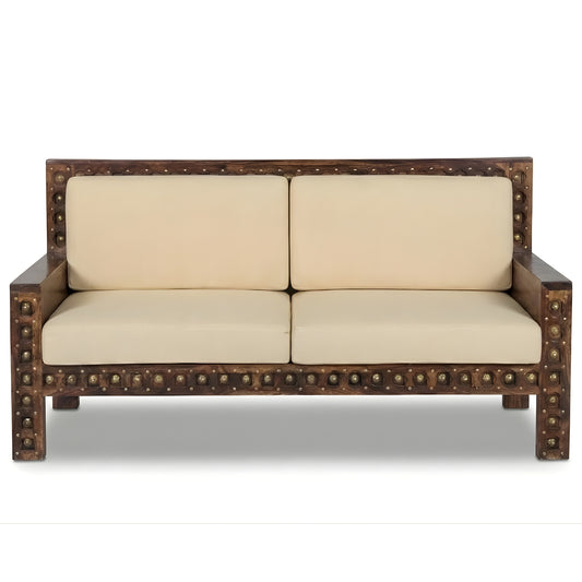 HANDCRAFTED STUDDED WOODEN 2 SEATER SOFA WITH BEIGE CUSHIONS