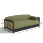 OLIVE GREEN SOFA WITH SCALLOPED BLACK FRAME AND CANE SIDES